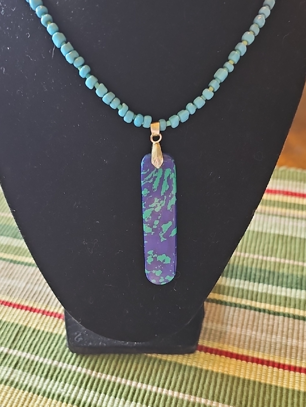 Handmade Blue-Green Beaded Necklace with Purple-Green Pendant. 20" Long.